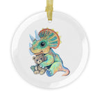 Baby Triceratops glass ornament with a hand drawn pastel pencil baby triceratops holding a teddy bear