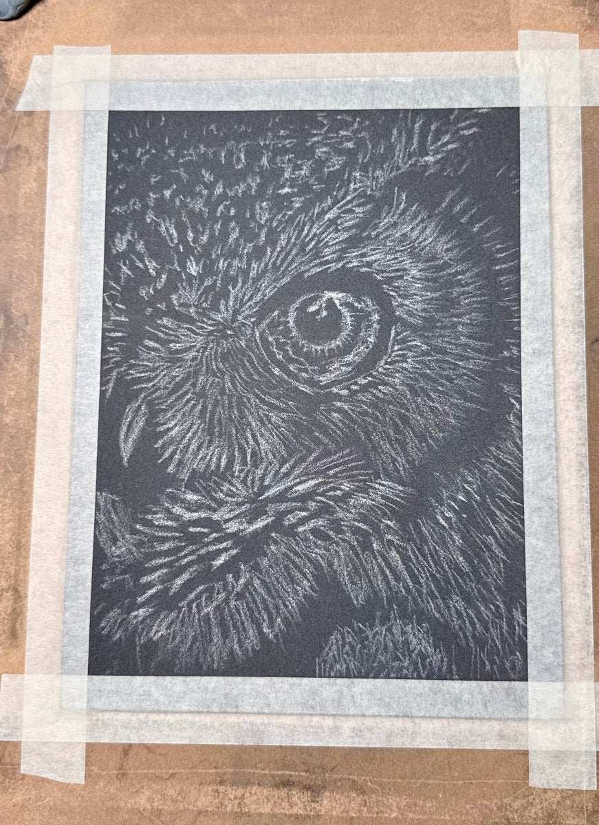 Great horned owl eye pastel pencil drawing, close view of the artwork