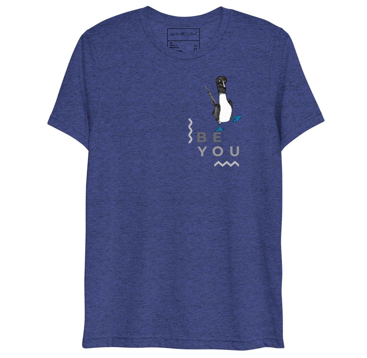 Navy triblend t-shirt featuring Be You in bold text with a detailed illustration of a blue-footed booby. Soft, lightweight fabric with a comfortable fit, showcasing lifelike textures in the artwork.